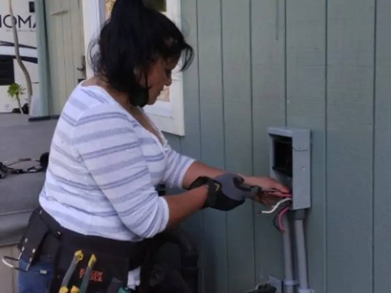 Licensed electrician wiring an exterior subpanel in Hagerstown